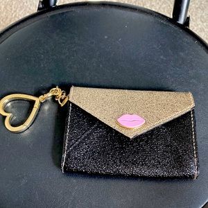 Victoria’s Secret cardholder. Barely used no markings